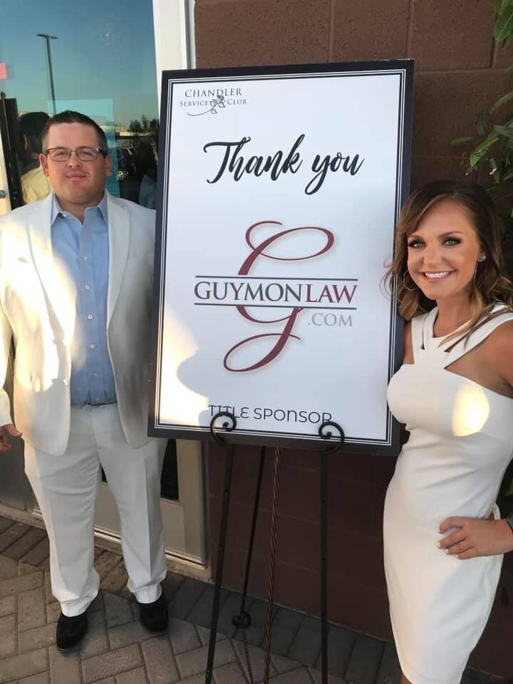 Guymon Law was a title sponsor, donating thousands of dollars to Chandler Service Club for Chandler children.Attorneys Amber Guymon and Kevin Hanger at the Chandler Service Club: White Out Hunger Event, April 2019